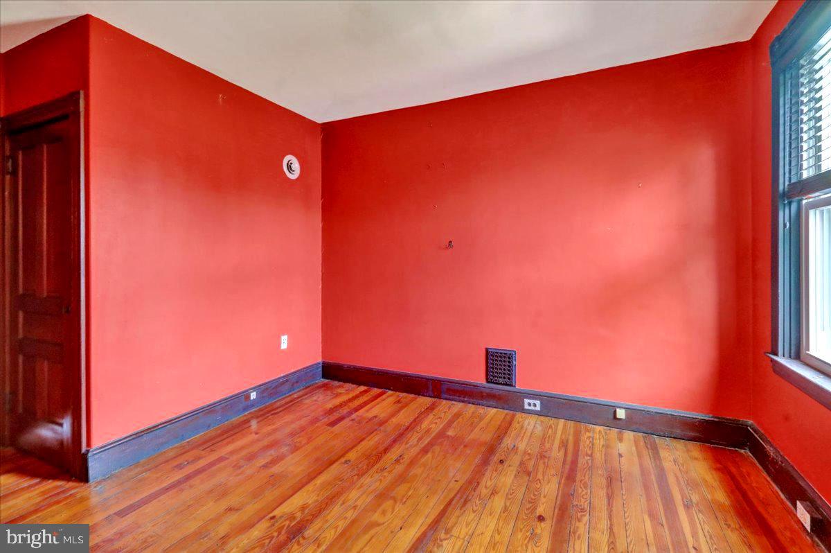 315 Nevin Street Lancaster, PA 17603 - Photo 33 of 41 a view of an empty room and wooden floor