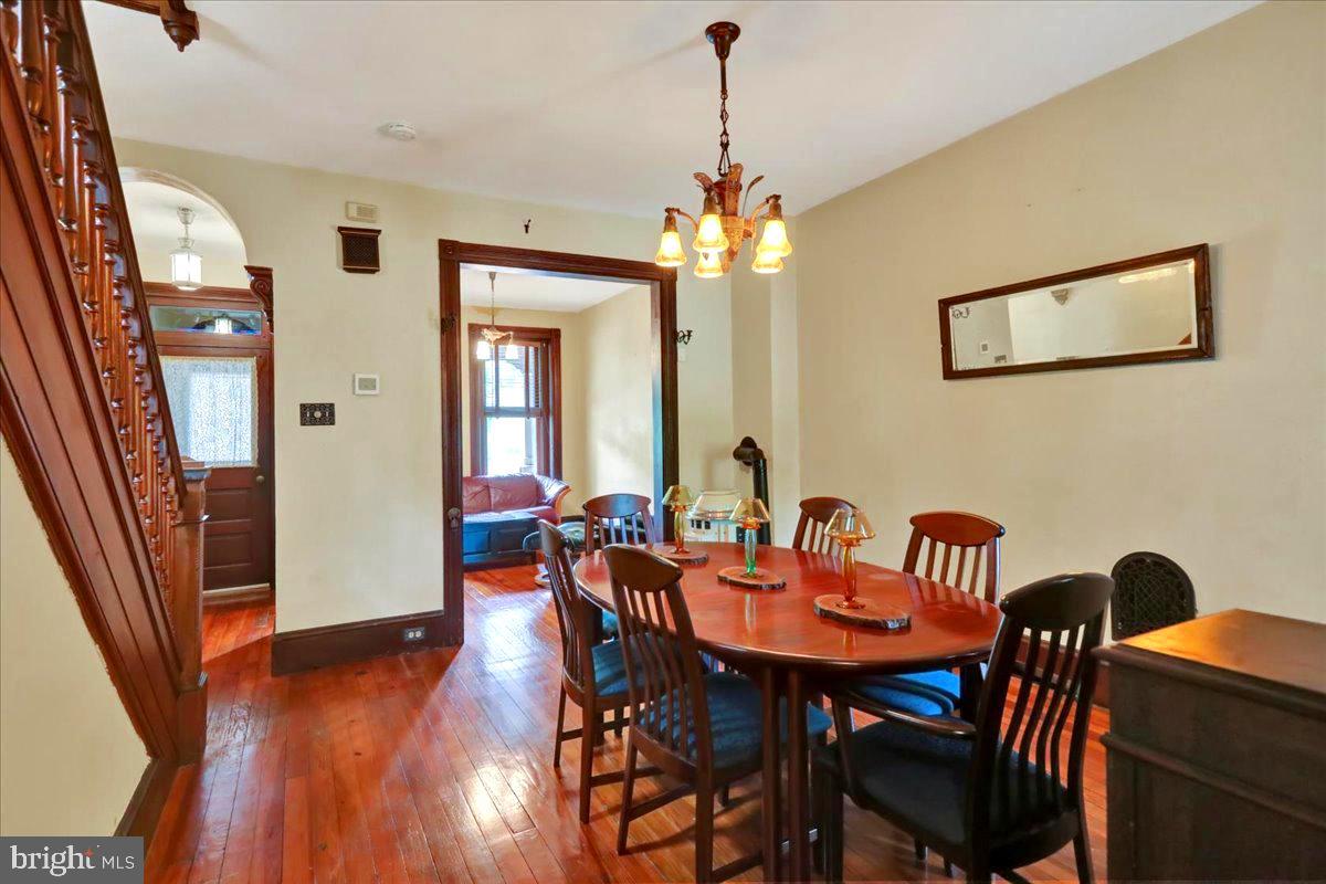 315 Nevin Street Lancaster, PA 17603 - Photo 8 of 41 a view of a dining room with furniture window and wooden floor
