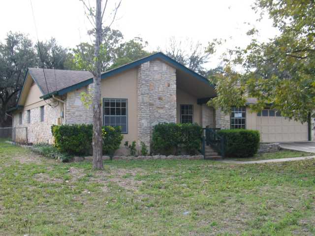 602 Del Prado Lane Georgetown, TX 78628 - Photo 1 of 1 a view of a yard in front of a house with large tree