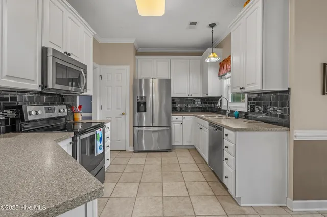 $615,000 | 550 Sunset Lakes Boulevard Southwest, Sunset Beach, NC 28468