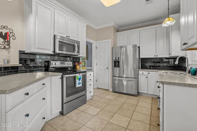 $615,000 | 550 Sunset Lakes Boulevard Southwest, Sunset Beach, NC 28468