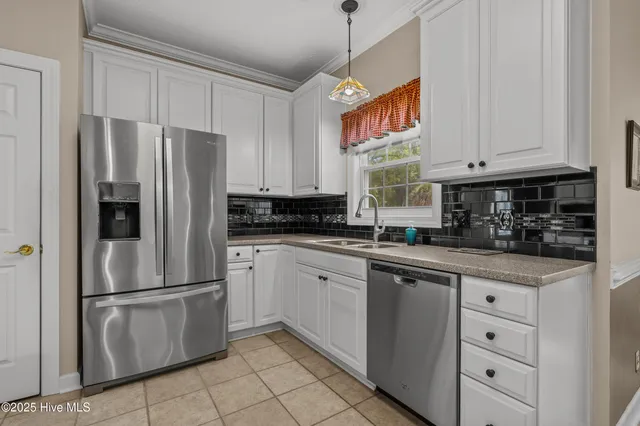 $615,000 | 550 Sunset Lakes Boulevard Southwest, Sunset Beach, NC 28468