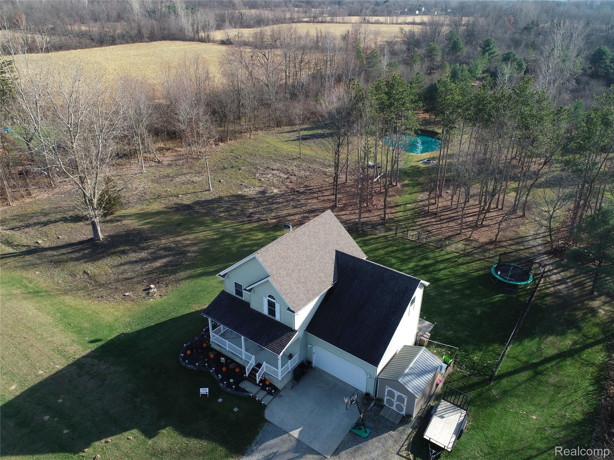 Beautiful Property! Fenced Backyard Area! Stocked Pond, ATV Trails!