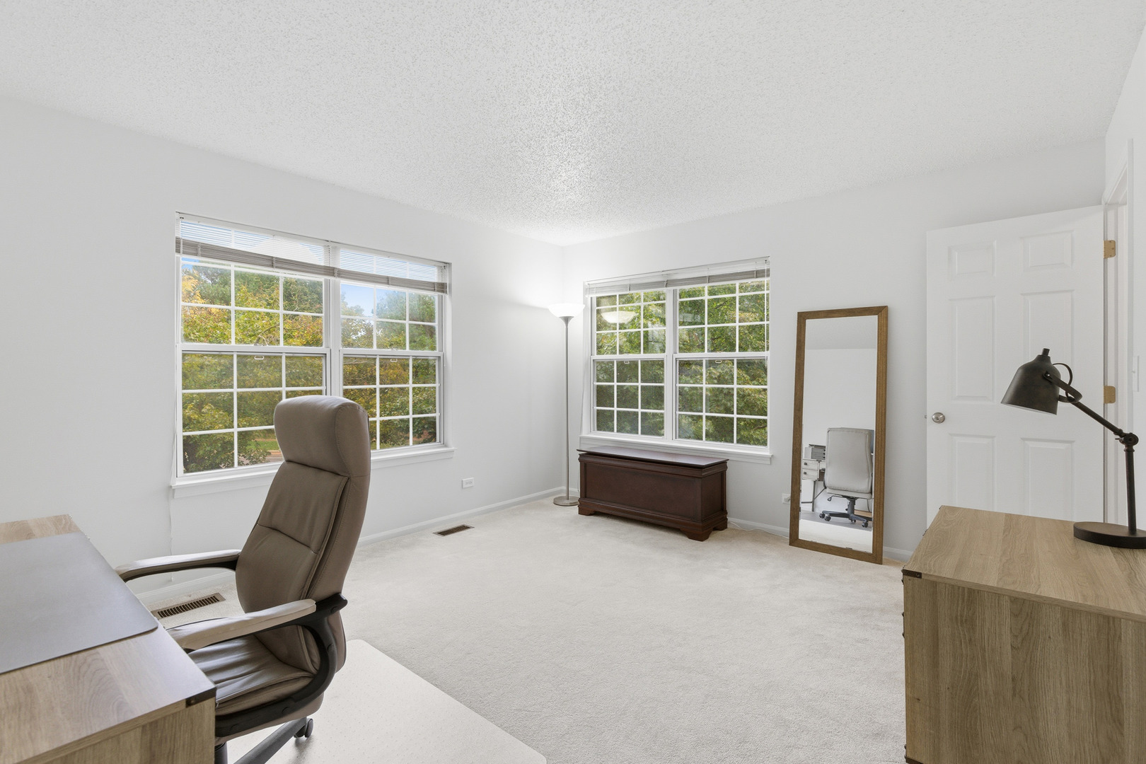 1411 Clybourne Street, Unit 11E Batavia, IL 60510 - Photo 20 of 34 a view of workspace with furniture and windows