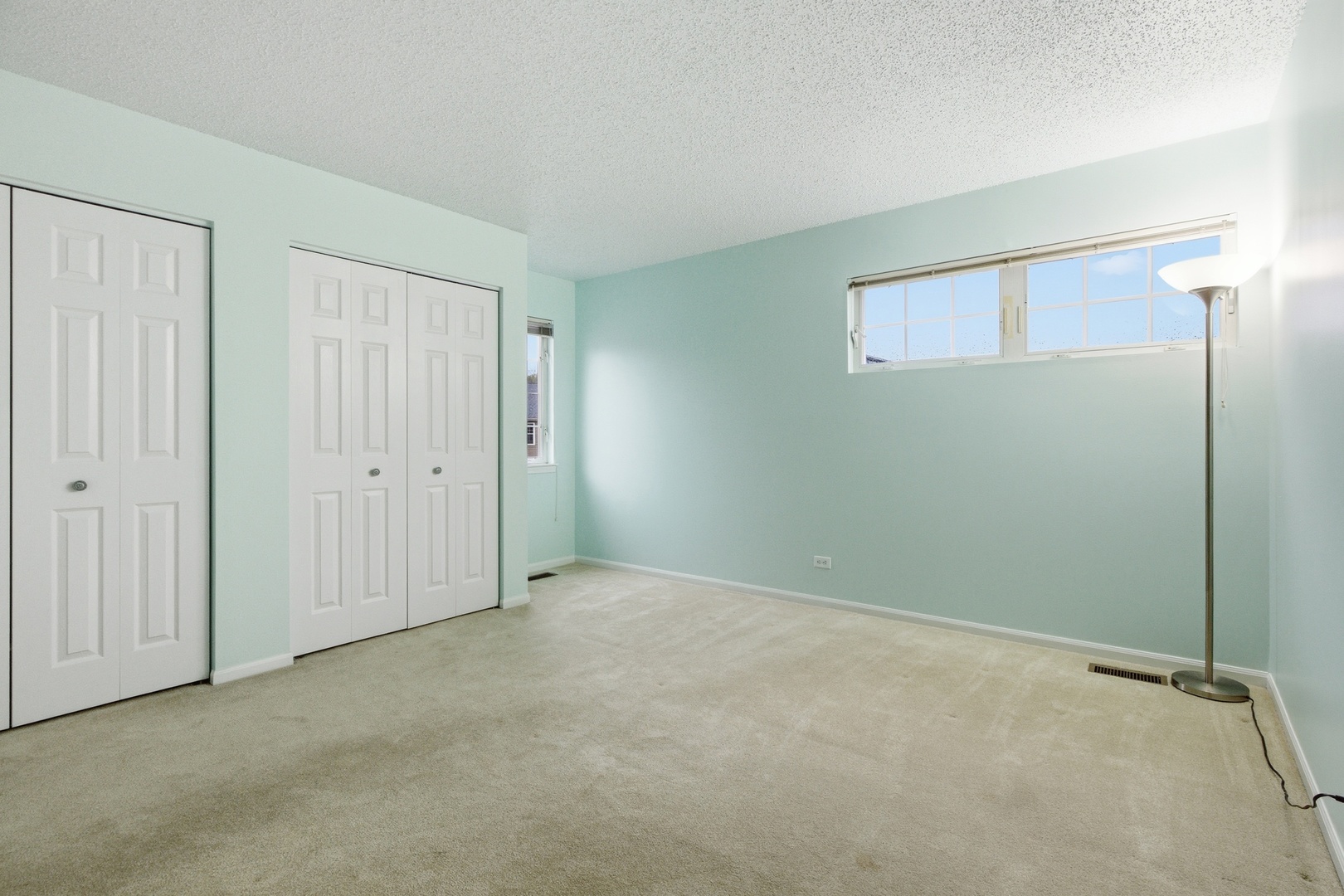 1411 Clybourne Street, Unit 11E Batavia, IL 60510 - Photo 21 of 34 a view of an empty room