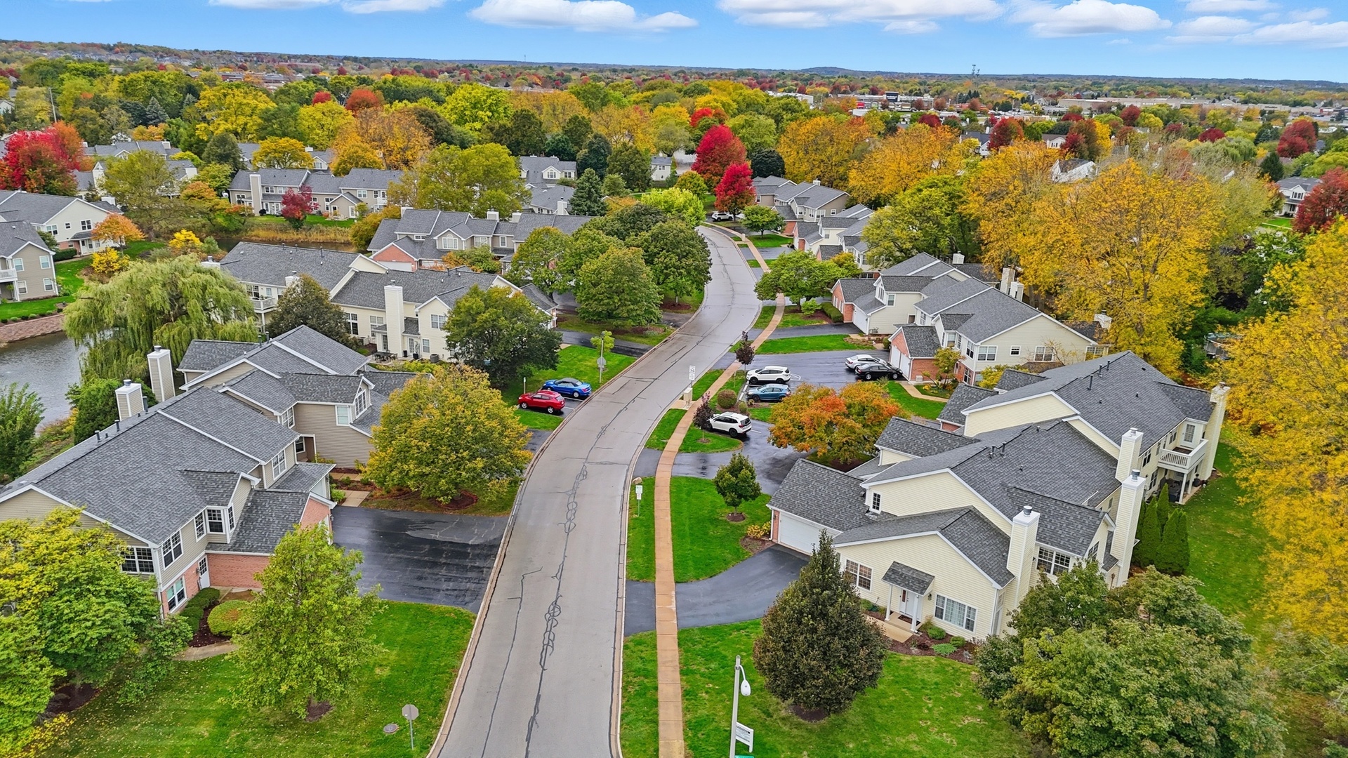 1411 Clybourne Street, Unit 11E Batavia, IL 60510 - Photo 30 of 34 an aerial view of a house with a lake view