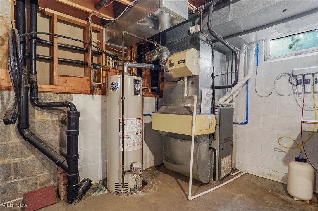 1660 Martin Road Mogadore, OH 44260 - Photo 50 of 50 Furnace and hot water tank plus reverse osmosis for kitchen sink