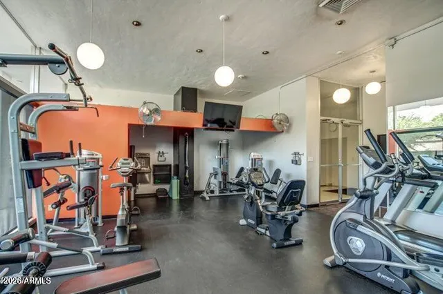 a view of a room with gym equipment