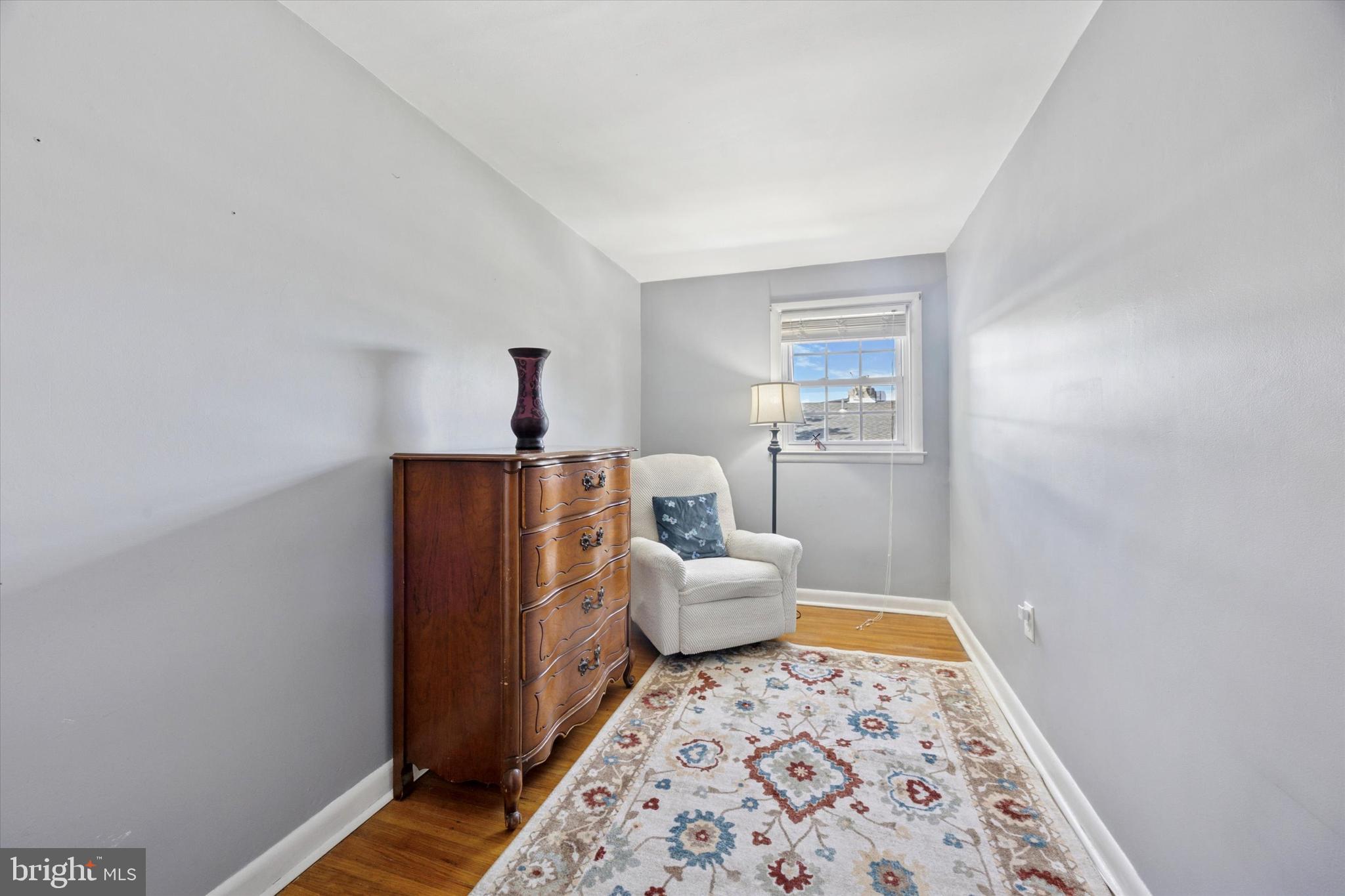 401 Haverford Road Folsom, PA 19033 - Photo 15 of 26 a bedroom with a bed and wooden floor