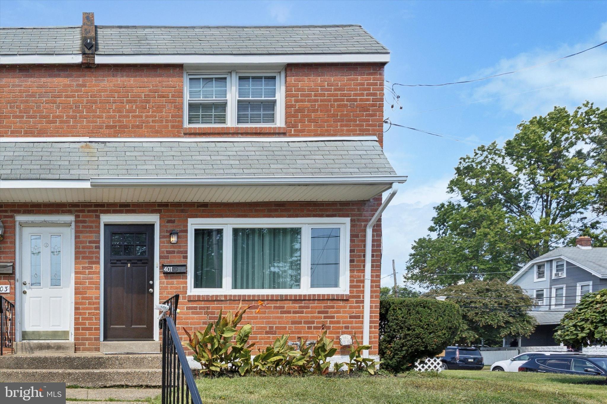 401 Haverford Road Folsom, PA 19033 - Photo 2 of 26 a front view of a house with garden