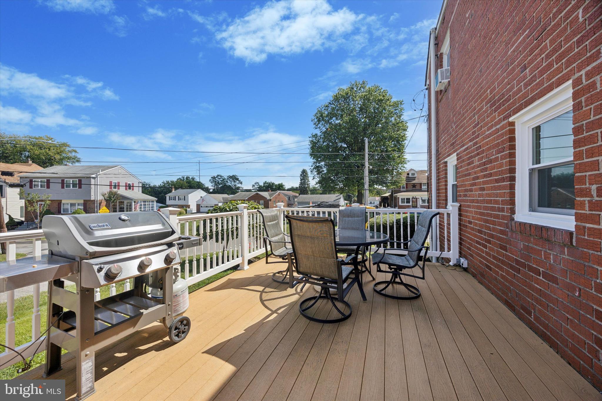 401 Haverford Road Folsom, PA 19033 - Photo 25 of 26 a view of a balcony with chairs and wooden floor