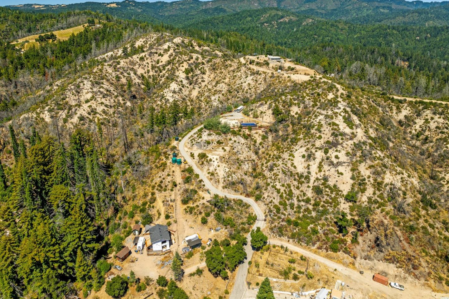500 Hill House Road Boulder Creek, CA 95006 - Photo 16 of 22 a view of a yard with a tree
