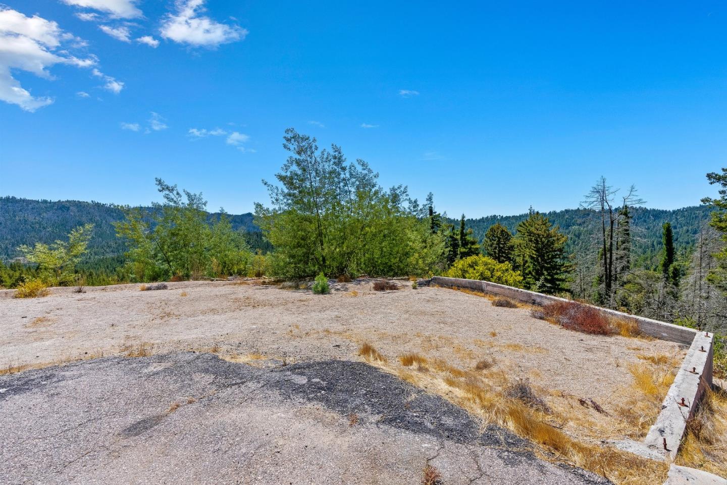 500 Hill House Road Boulder Creek, CA 95006 - Photo 9 of 22 a view of a road with a house in the background
