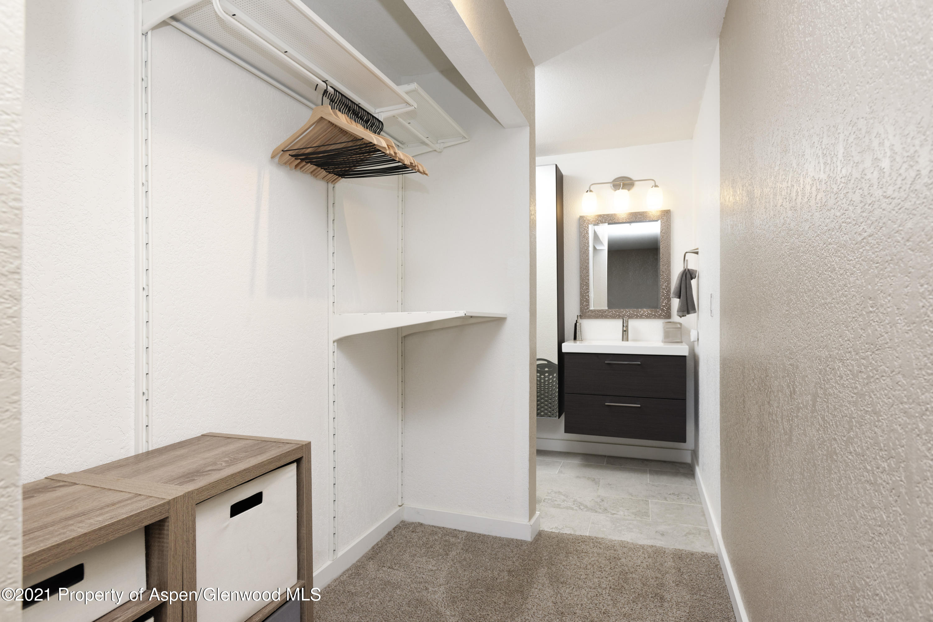 8104 Elk Lane Basalt, CO 81621 - Photo 9 of 13 a bathroom with a sink and a mirror