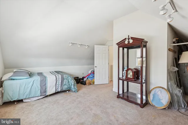 a bathroom with a toilet a sink and a shower