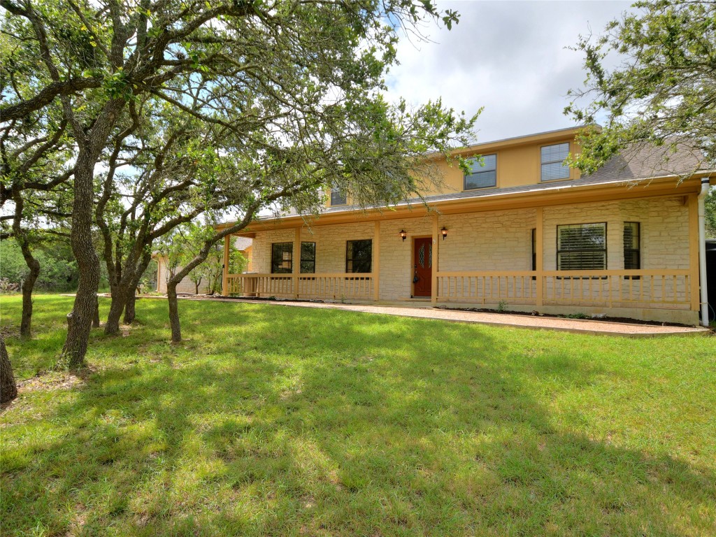 328 Fawnridge Street Georgetown, TX 78628 - Photo 1 of 36 a front view of house with yard and green space