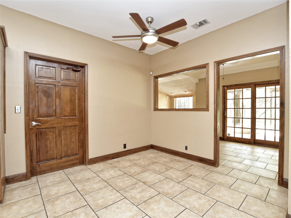 328 Fawnridge Street Georgetown, TX 78628 - Photo 11 of 36 a view of a livingroom with a ceiling fan and window