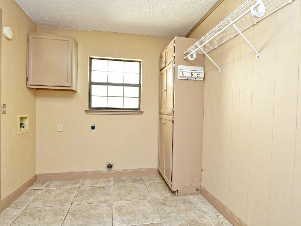 328 Fawnridge Street Georgetown, TX 78628 - Photo 14 of 36 a view of a garage with window