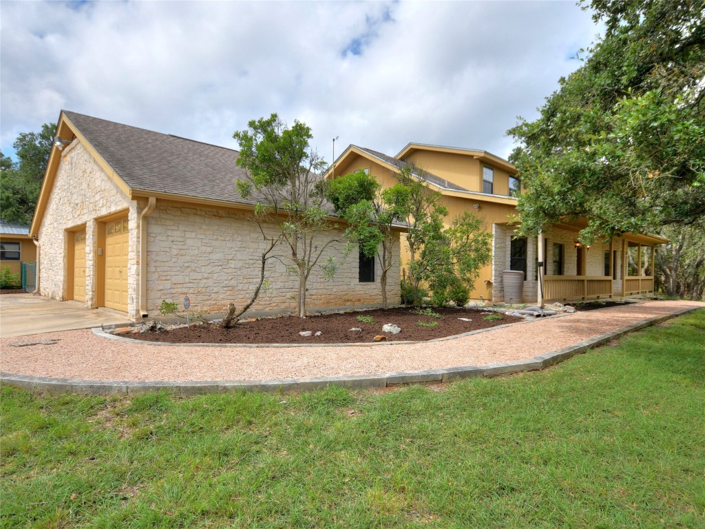 328 Fawnridge Street Georgetown, TX 78628 - Photo 3 of 36 a backyard of a house with table and chairs