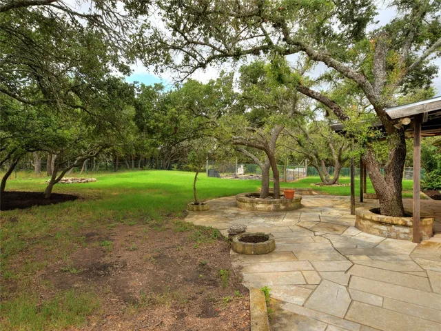 a view of a backyard with a garden