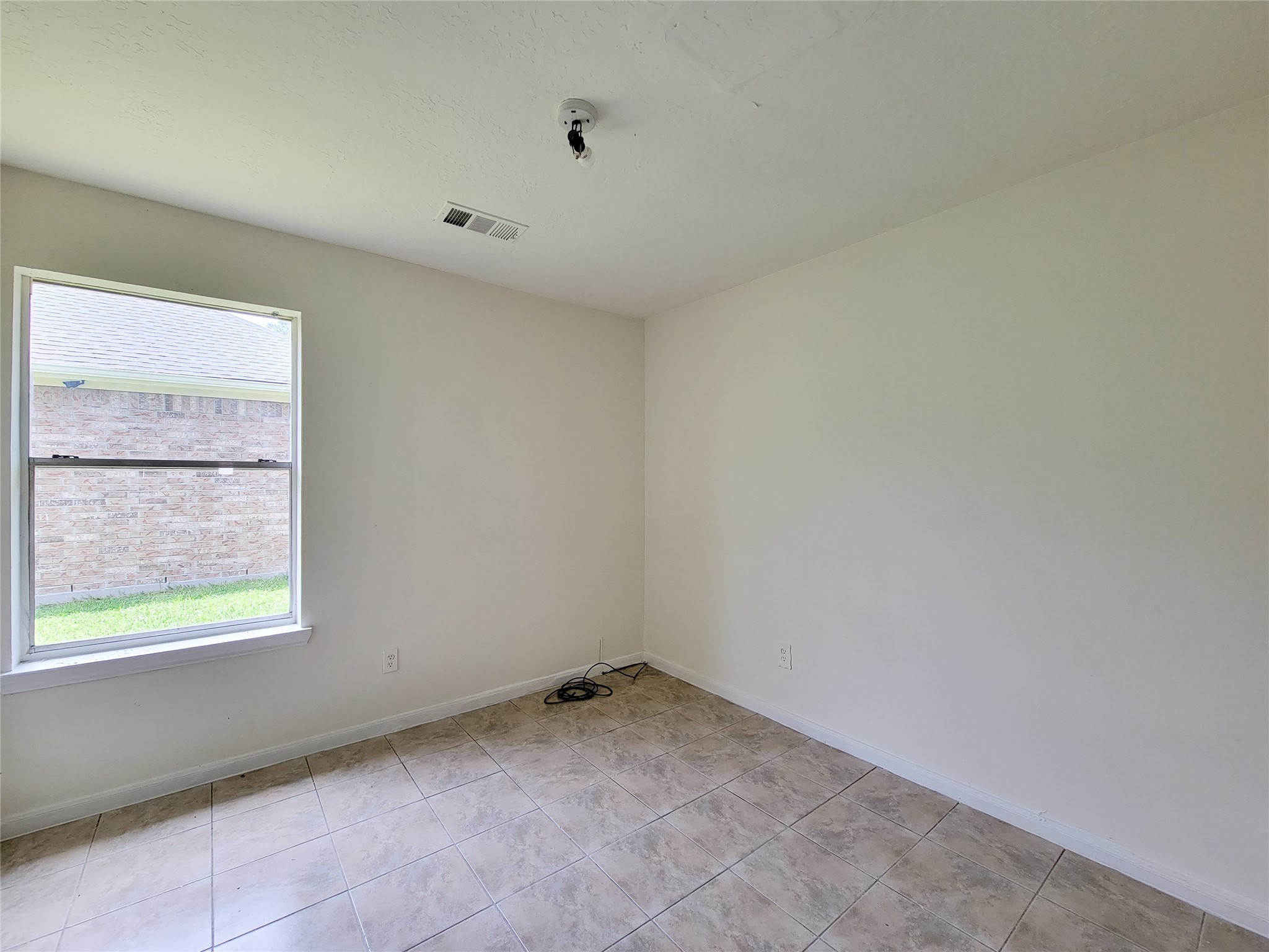 3307 Pine Dust Lane Spring, TX 77373 - Photo 16 of 28 a view of a room that has a window in it