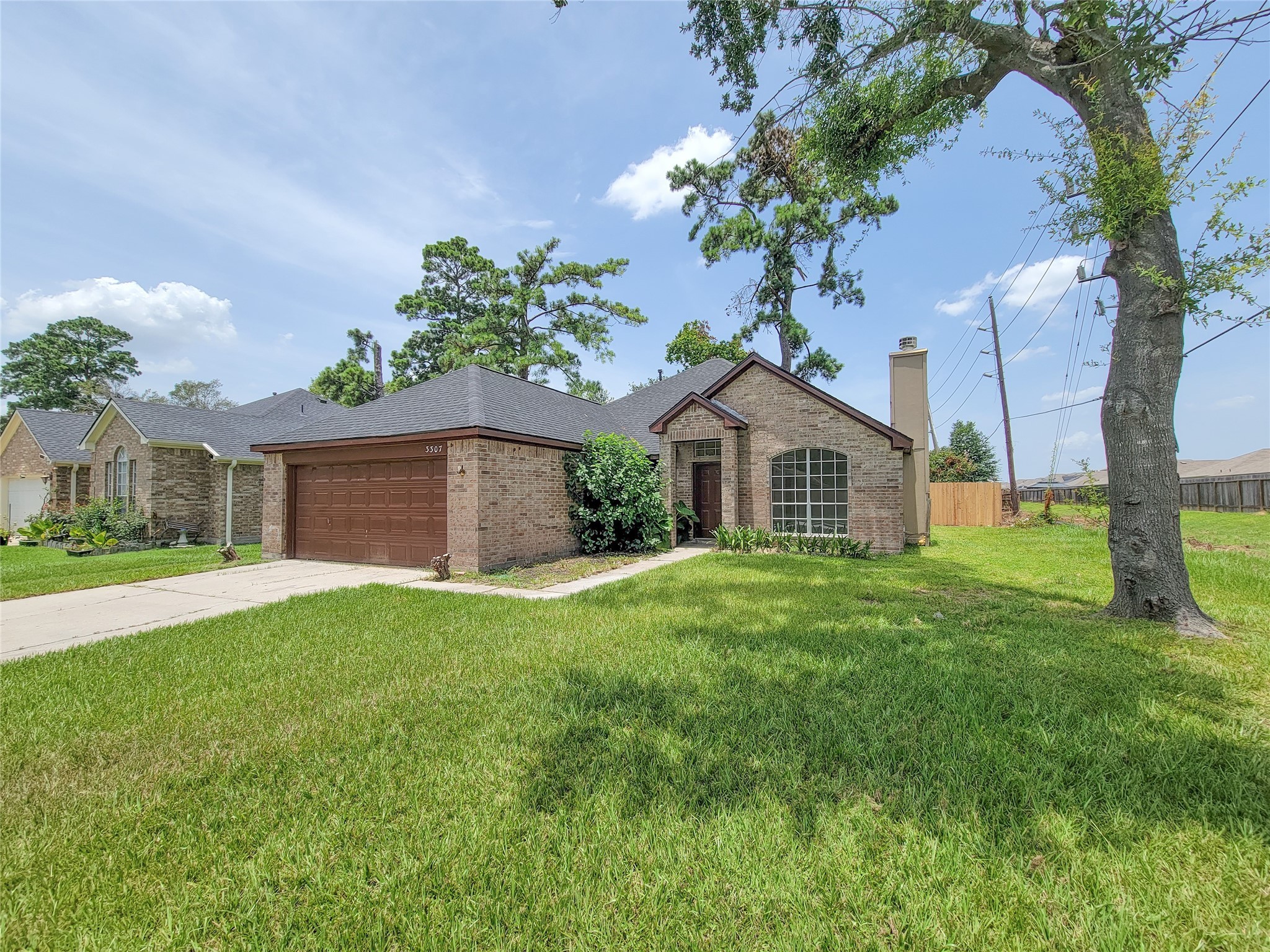 3307 Pine Dust Lane Spring, TX 77373 - Photo 25 of 28 a front view of a house with garden