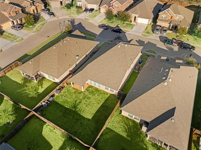 an aerial view of a tennis ground