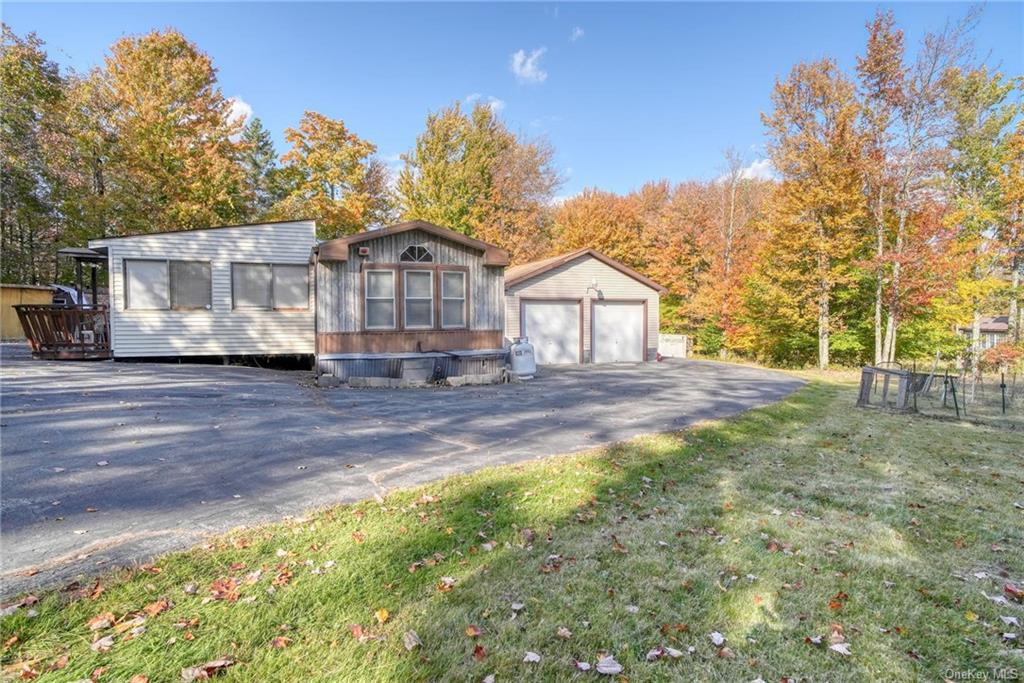 695 Budd Road Woodbourne, NY 12788 - Photo 1 of 23 a view of a house with a yard