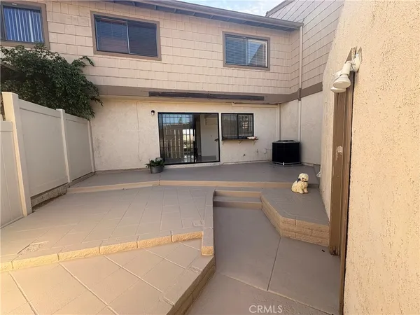 a view of a house with a patio