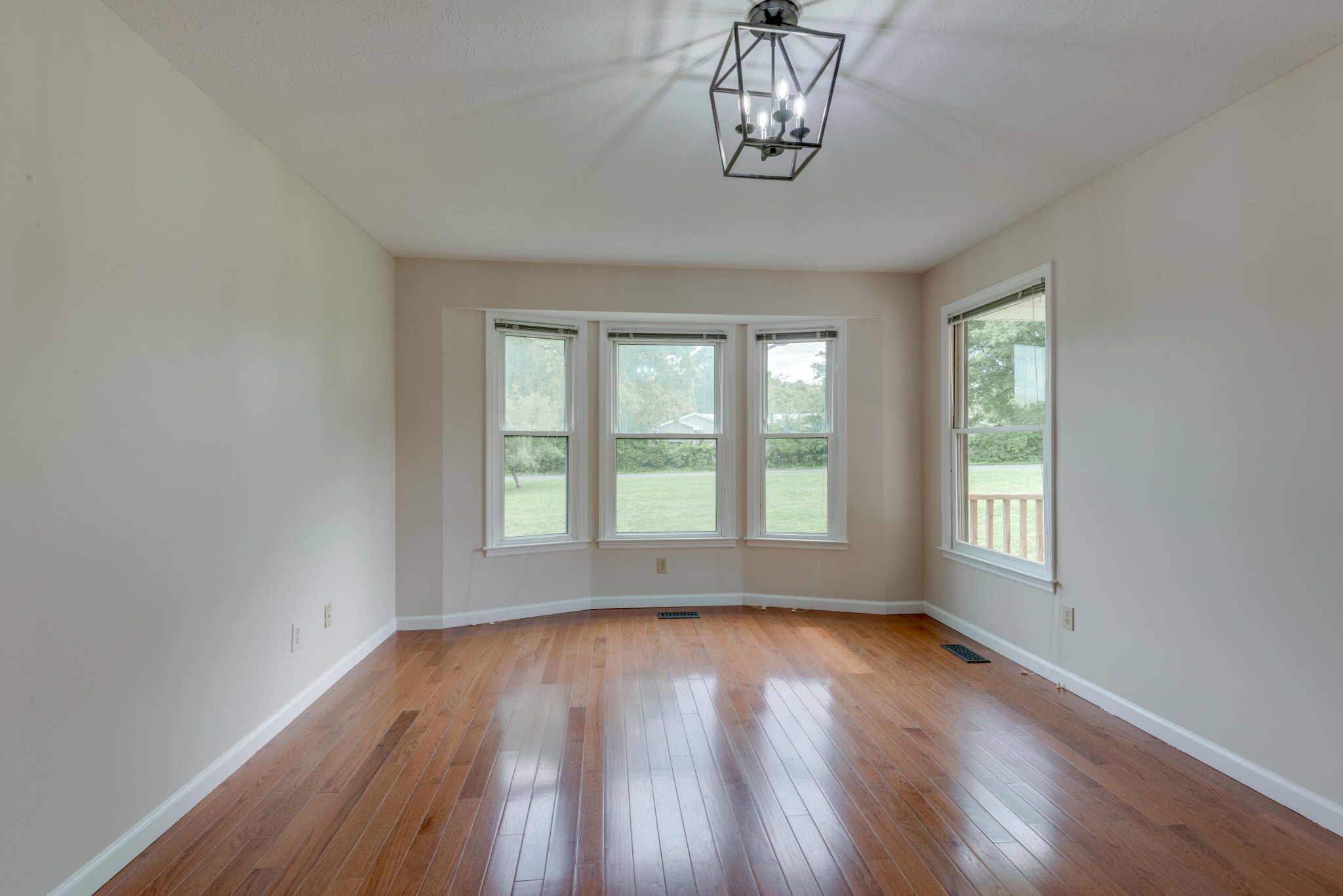 146 Howard Road White Bluff, TN 37187 - Photo 14 of 25 a view of empty room with wooden floor and fan