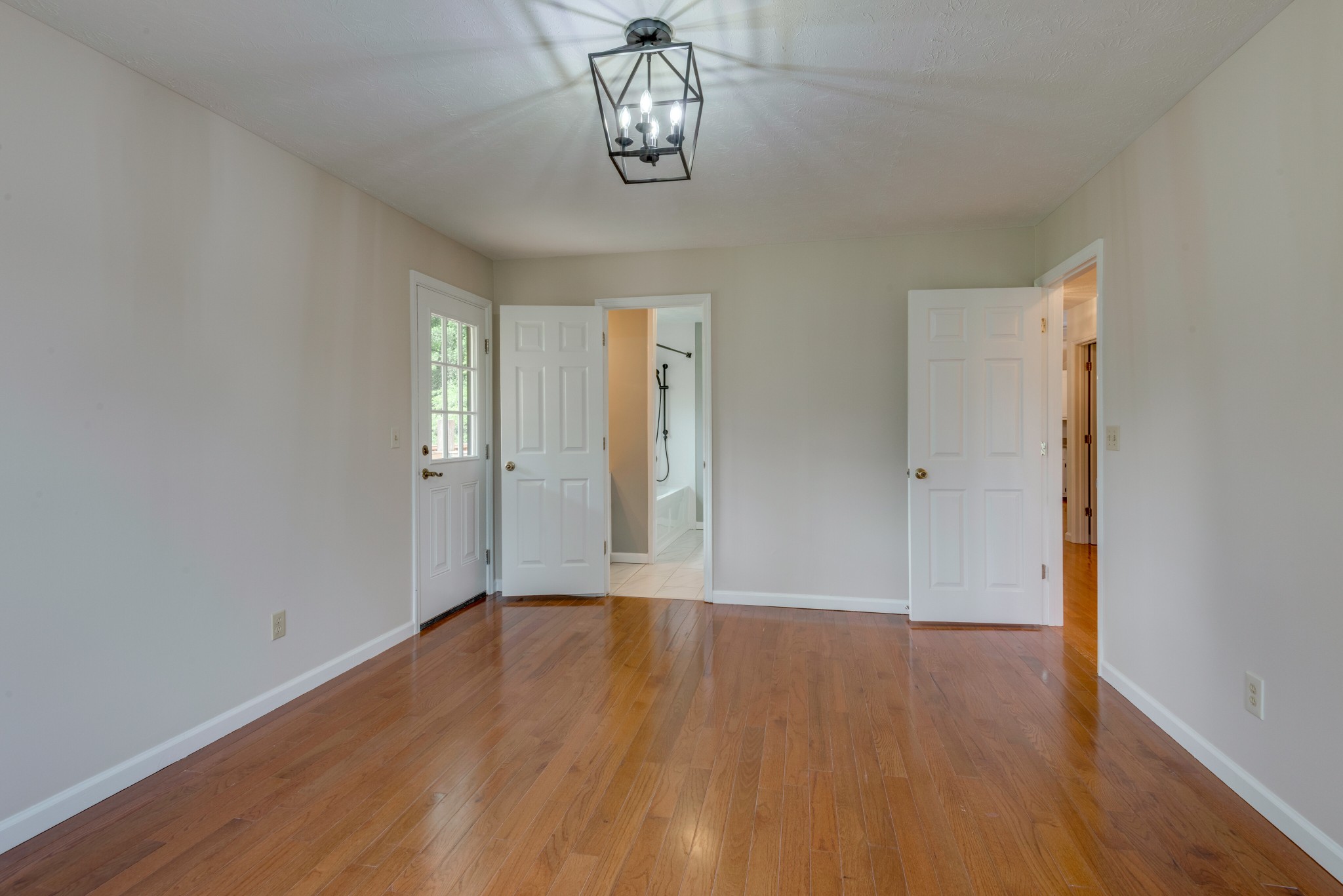 146 Howard Road White Bluff, TN 37187 - Photo 15 of 25 wooden floor in an empty room with a window