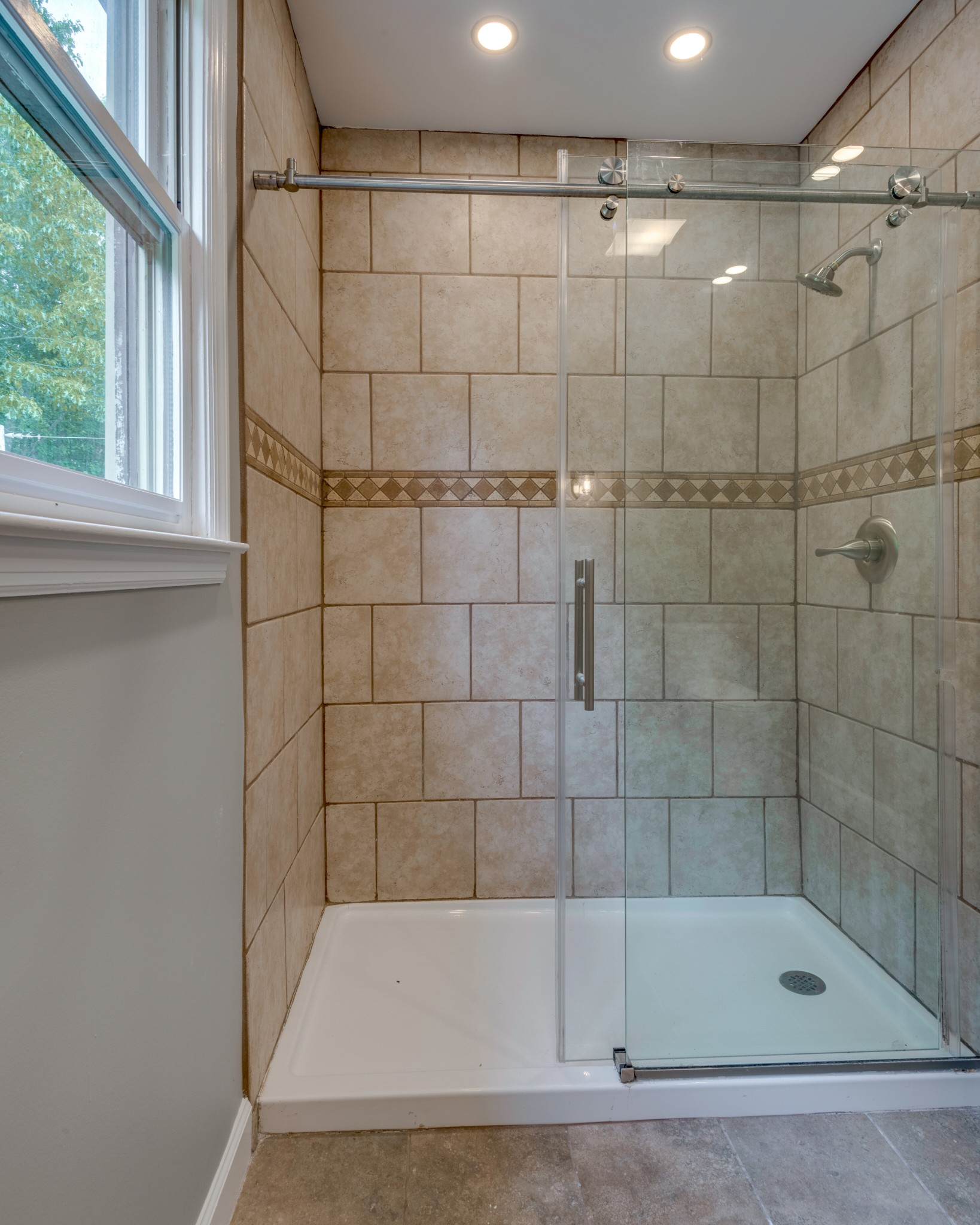 146 Howard Road White Bluff, TN 37187 - Photo 21 of 25 a bathroom with a shower and a bathtub