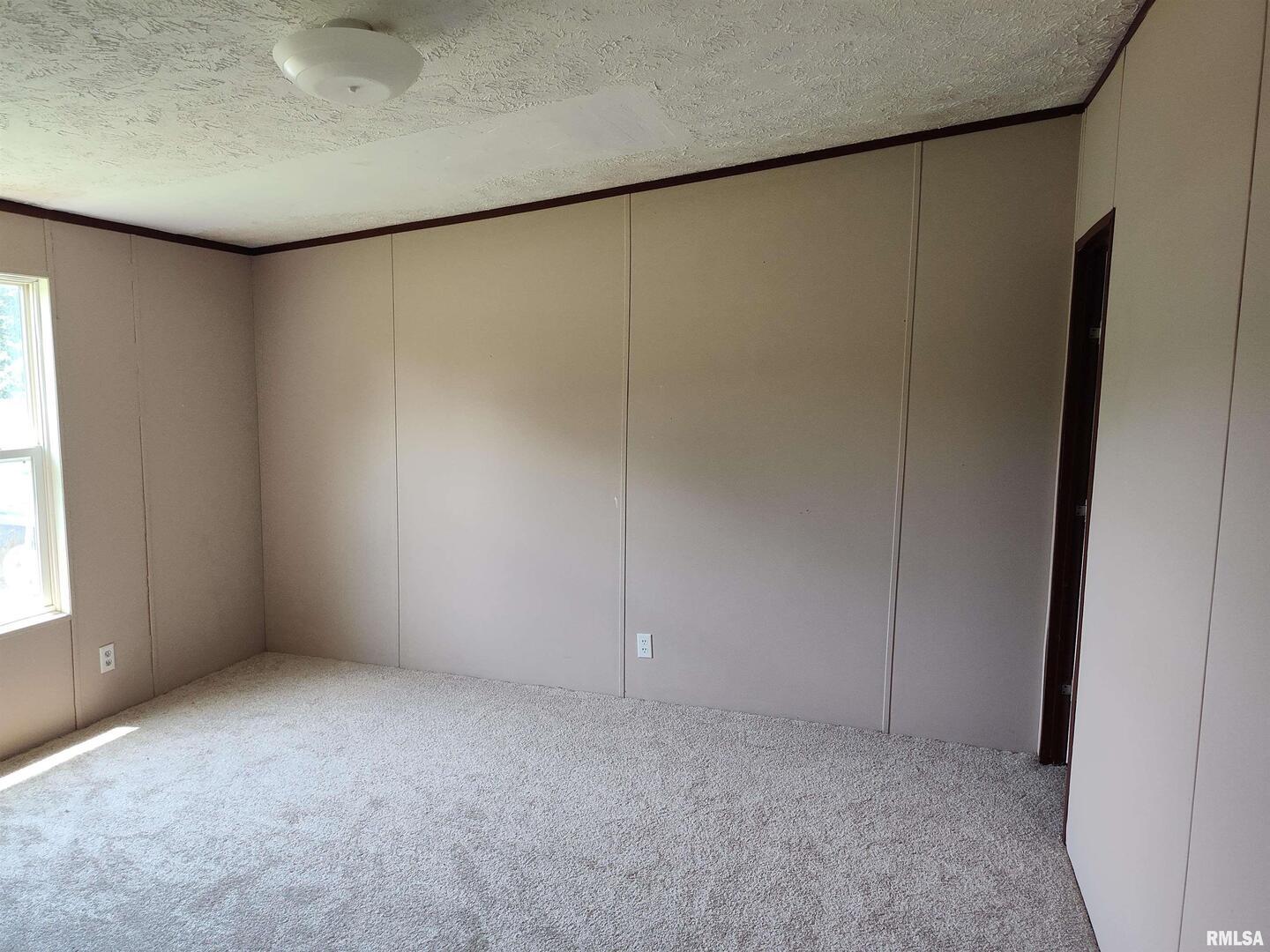 531 Cemetery Road Grayville, IL 62844 - Photo 9 of 18 an empty room with window