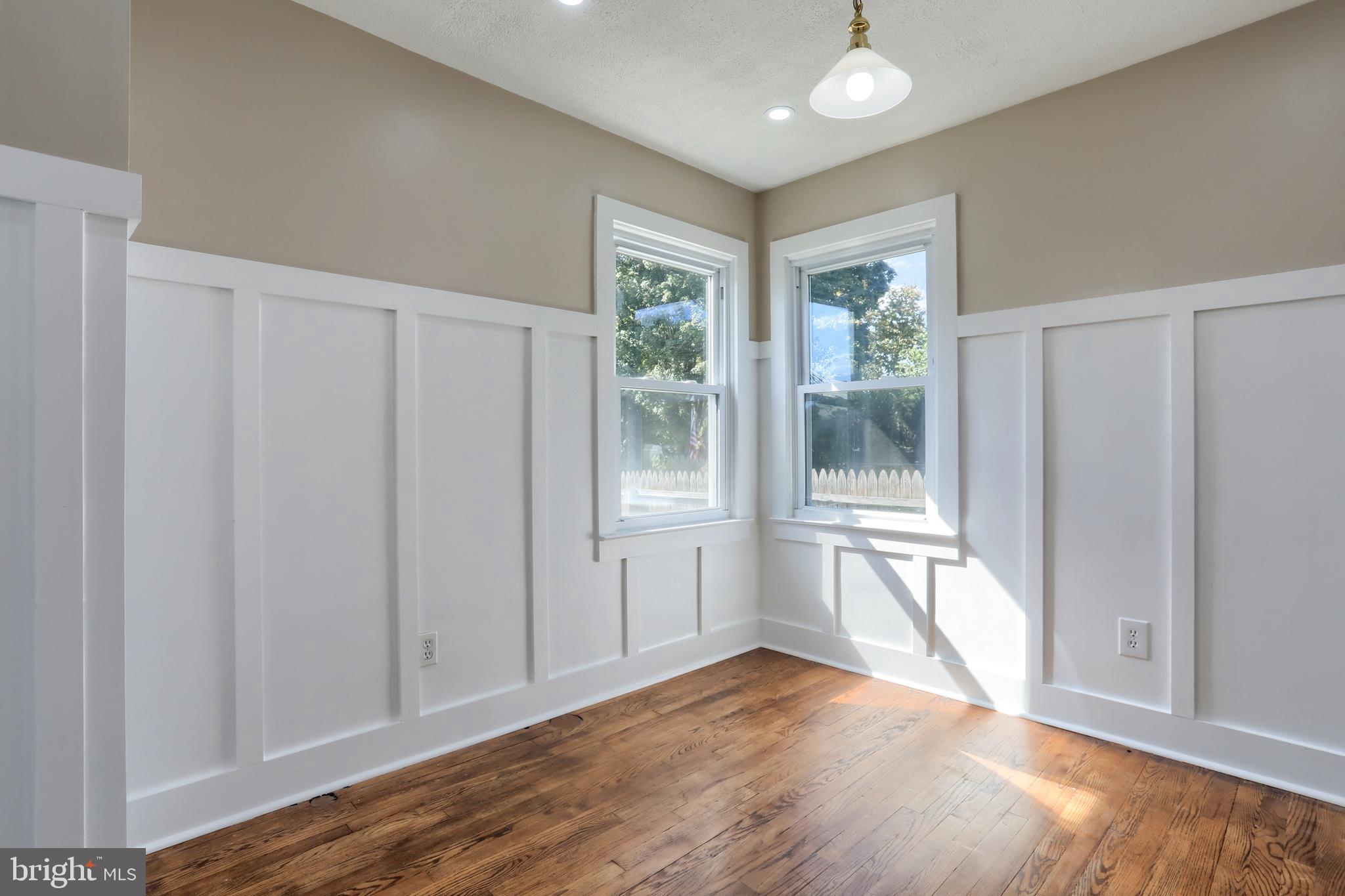 517 South 5th Street Lebanon, PA 17042 - Photo 15 of 29 a view of an empty room with wooden floor and a window