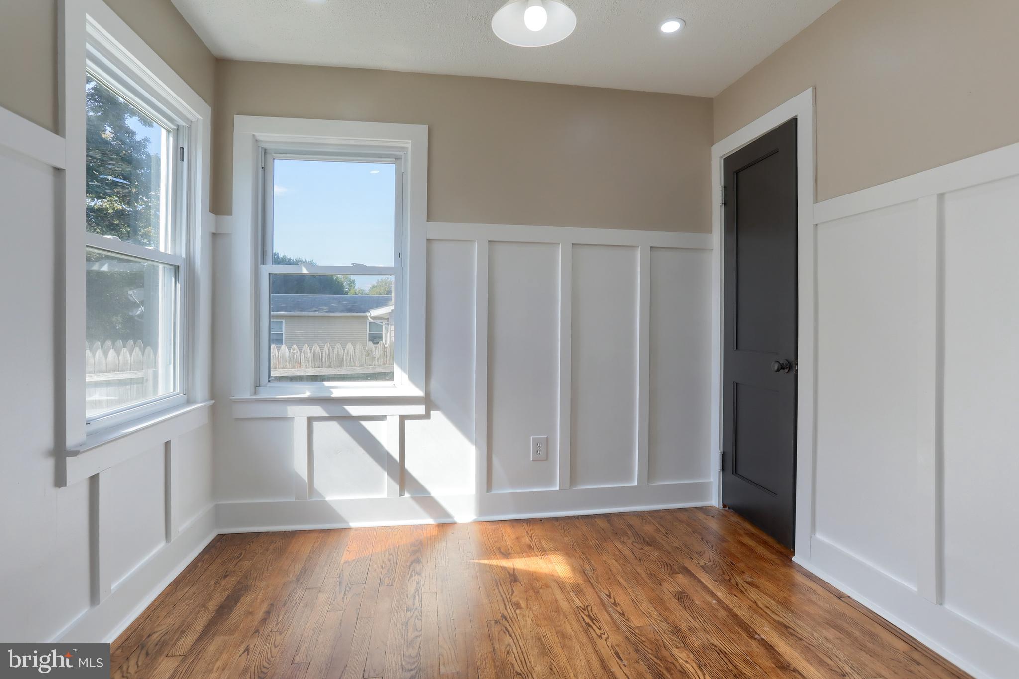 517 South 5th Street Lebanon, PA 17042 - Photo 16 of 29 a view of empty room with wooden floor and fan