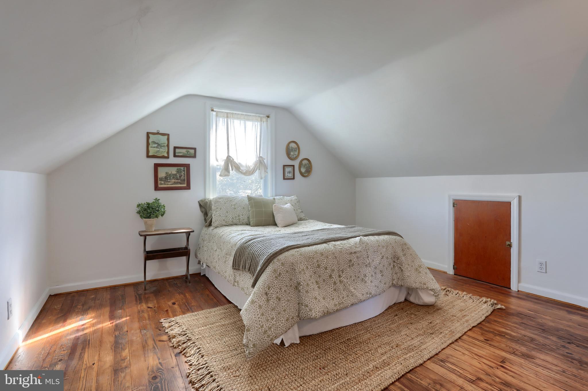 517 South 5th Street Lebanon, PA 17042 - Photo 19 of 29 a bedroom with a bed and a painting
