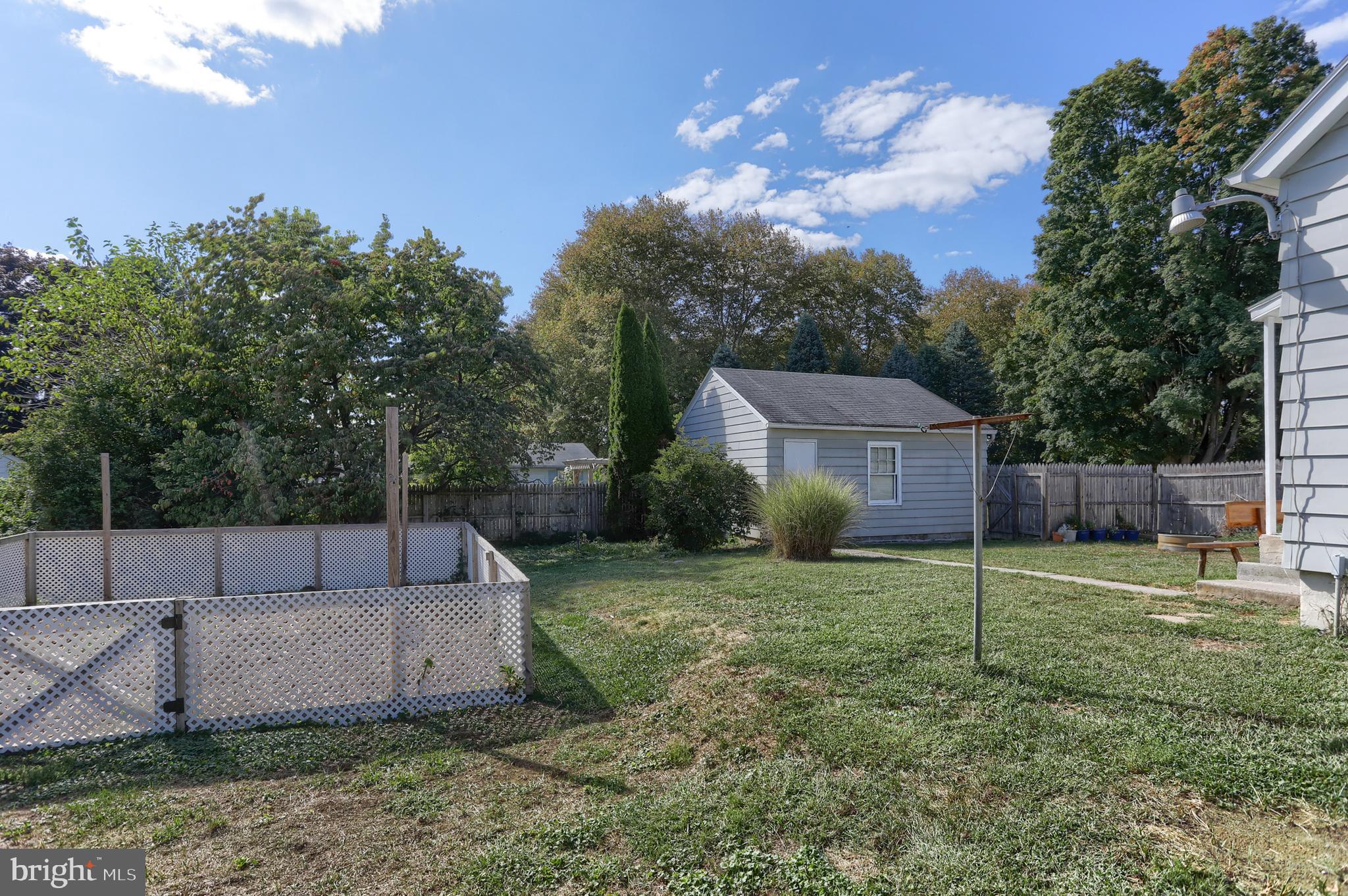 517 South 5th Street Lebanon, PA 17042 - Photo 27 of 29 a view of a house with a backyard and a tree