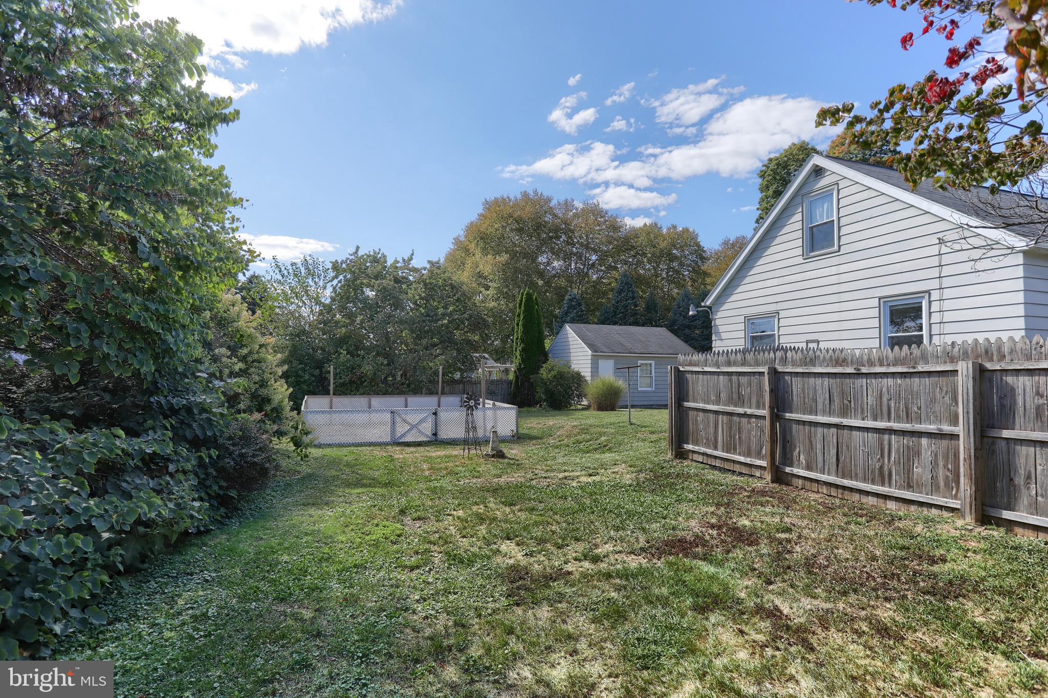517 South 5th Street Lebanon, PA 17042 - Photo 3 of 29 a view of a backyard with a small cabin