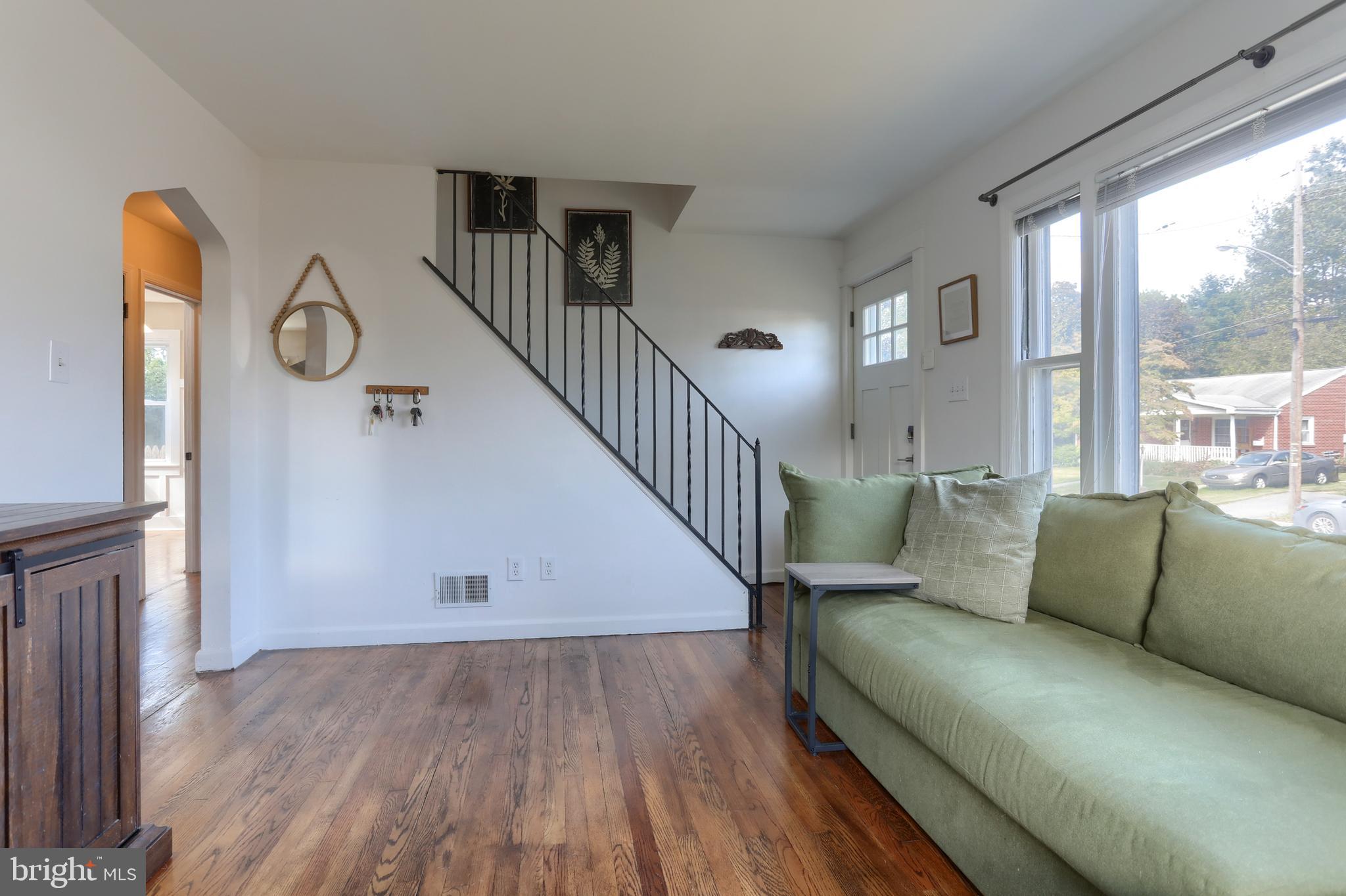 517 South 5th Street Lebanon, PA 17042 - Photo 4 of 29 a living room with furniture and a wooden floor