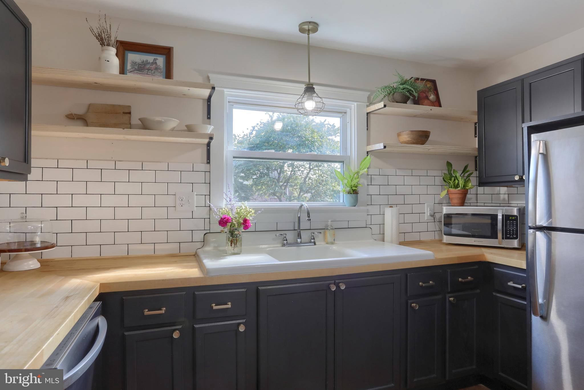 517 South 5th Street Lebanon, PA 17042 - Photo 9 of 29 a kitchen with a sink cabinets and window