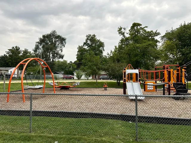 a view of a park with swings