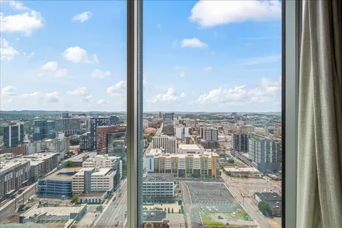 a view of a balcony with city view