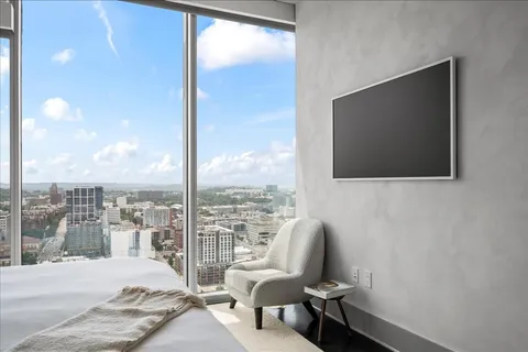 a view of a livingroom with furniture and front door