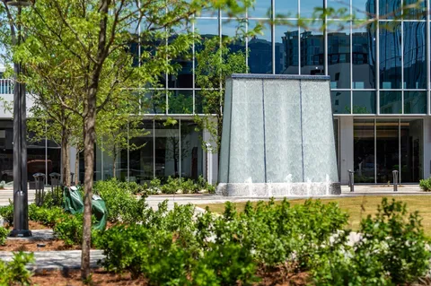 a bathroom with a sink a double vanity and a mirror