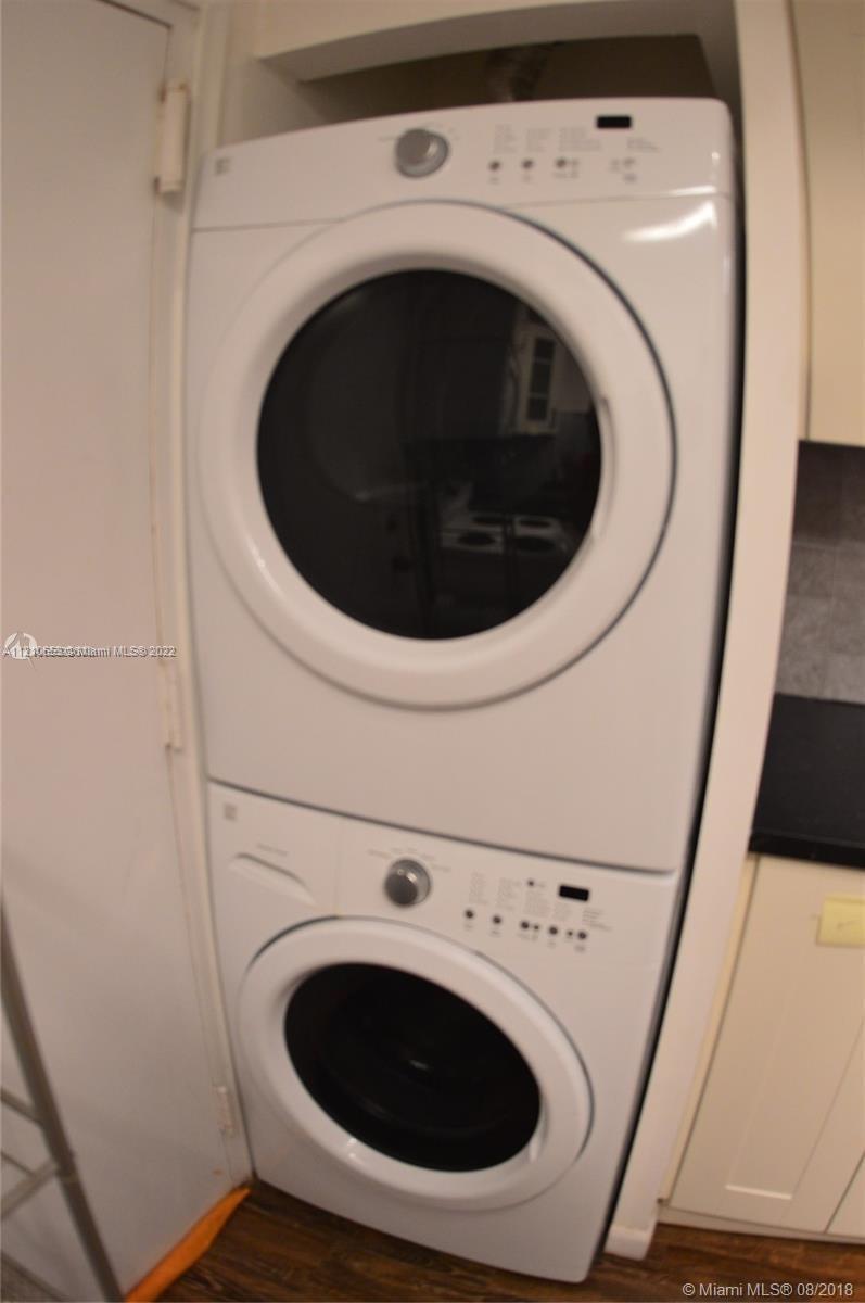 13700 Southwest 62nd Street, Unit 149 Miami, FL 33183 - Photo 14 of 36 a utility room with dryer and washer