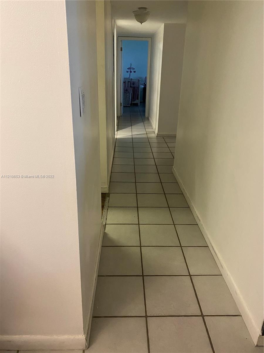 13700 Southwest 62nd Street, Unit 149 Miami, FL 33183 - Photo 17 of 36 a view of an empty room