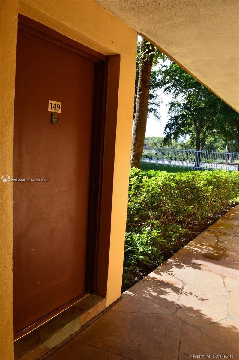 13700 Southwest 62nd Street, Unit 149 Miami, FL 33183 - Photo 4 of 36 a view of a backyard