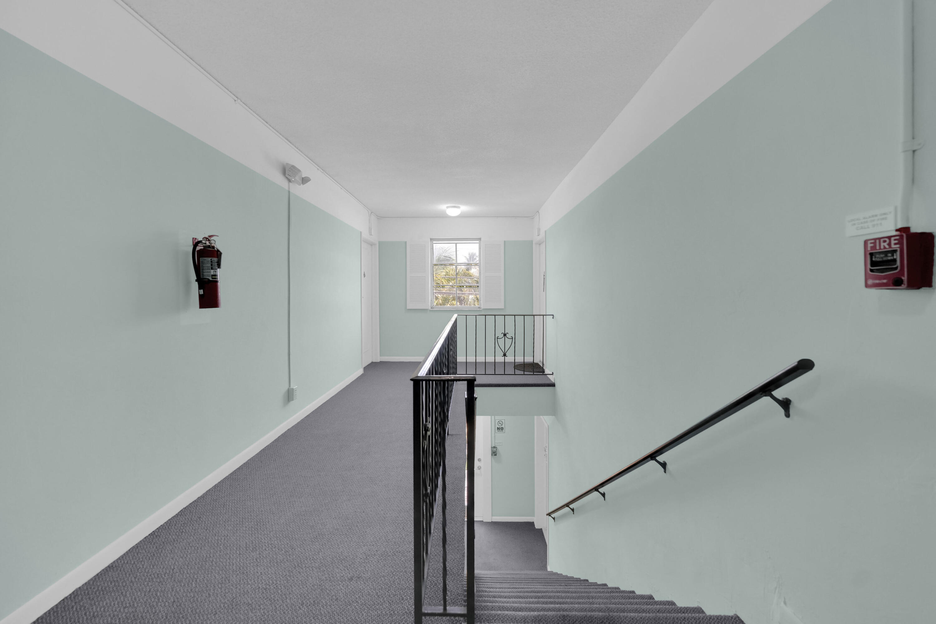406 South Cypress Road, Unit 330 Pompano Beach, FL 33060 - Photo 23 of 38 a view of entryway with wooden floor