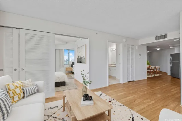 a living room with furniture and a table