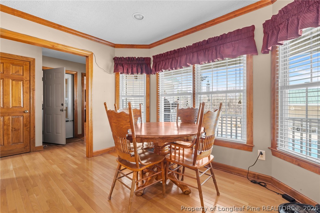 4240 Nicholson Road Cameron, NC 28326 - Photo 26 of 49 a view of a dining room with furniture window and outside view